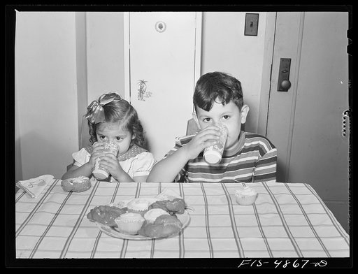Brooklyn, New York. Red Hook housing development. Annette and Jimmy Caputo drinking milk