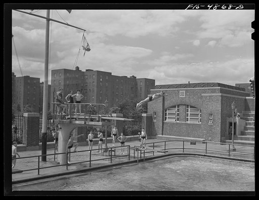 Brooklyn, New York. Red Hook housing development. Diving pool at the play center which is supervised by the city's Department of Parks. There are separate pools for swimming and diving. Charge is nine cents for children, twenty five cents for adults