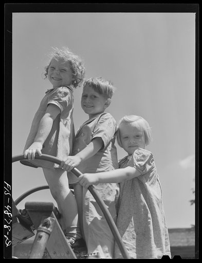 Brooklyn, New York. Red Hook housing development. Children on a slide in the kindergarten playground of the community center