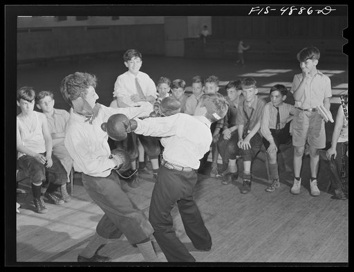 Brooklyn, New York. Red Hook housing development. Boxing match in the gymnasium of the community center