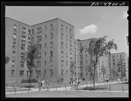 Brooklyn, New York. Red Hook housing project. Children coming home from school