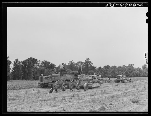 Bridgeton, New Jersey. Seabrook Farms. Refueling tractors in the field