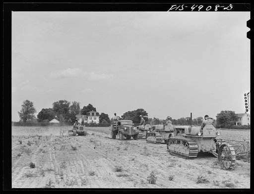 Bridgeton, New Jersey. Seabrook Farms. Refueling tractors in the field