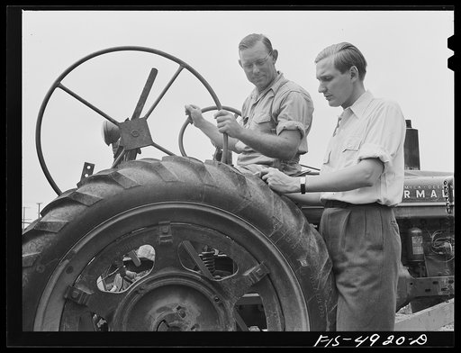 Bridgeton, New Jersey. Seabrook Farms. John Seabrook with a tractor operator