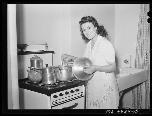 Brooklyn, New York. Red Hook housing project. Mrs. Caputo cooking