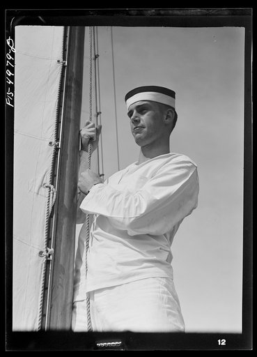 Untitled photo, possibly related to: U.S. Naval Academy, Annapolis, Maryland. Midshipman hoisting a sail