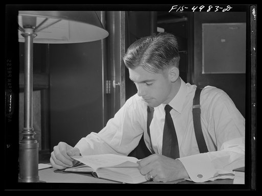 U.S. Naval Academy, Annapolis, Maryland. Midshipman studying