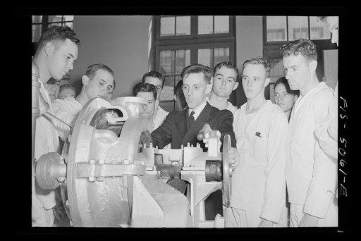 Untitled photo, possibly related to: U.S. Naval Academy, Annapolis, Maryland. Studying an engine