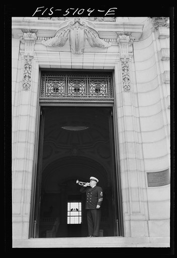 U.S. Naval Academy, Annapolis, Maryland. Chief petty officer blowing a bugle call