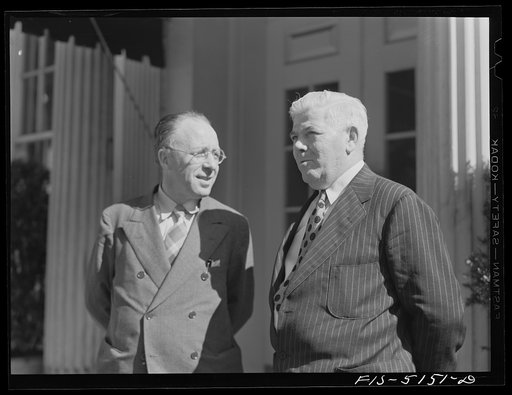 Untitled photo, possibly related to: Washington, D.C. Mr. Este, a Swedish jounralist, with Mike McDermott of the U.S. State Department after President Roosevelt's press conference