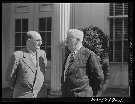 Washington, D.C. Mr. Hedman, a Swedish journalist, with Mike McDermott of the U.S. Department, after President Roosevelt's press conference