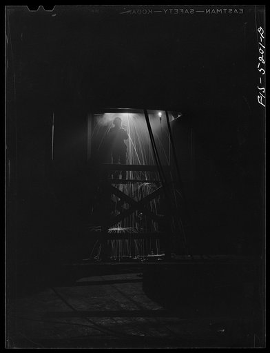 Untitled photo, possibly related to: Decatur, Alabama. Ingalls Shipbuilding Company. Welding one of the bulkheads in the hold of one of the oceangoing barges