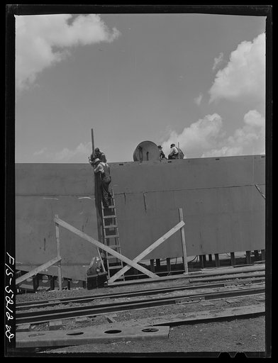 Decatur, Alabama. Ingalls Shipbuilding Company. Barge under construction in the yard