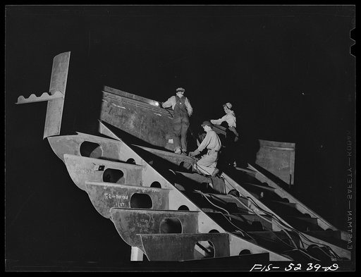 Decatur, Alabama. Ingalls Shipbuilding Company. Work goes on twenty-four hours a day. The night shift working on the stern of one of the barges under construction
