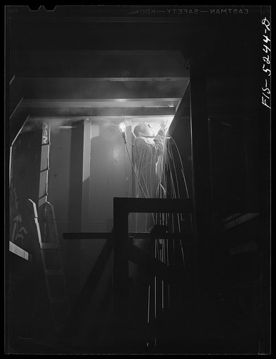 Untitled photo, possibly related to: Decatur, Alabama. Ingalls Shipbuilding Company. Welding one of the bulkheads in the hold of one of the oceangoing barges