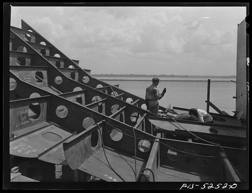 Untitled photo, possibly related to: Decatur, Alabama. Ingalls Shipbuilding Company. Working on the stern of one of the cargo barges under construction