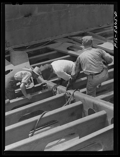 Decatur, Alabama. Ingalls Shipbuilding Company. Welders working on the stern of a barge