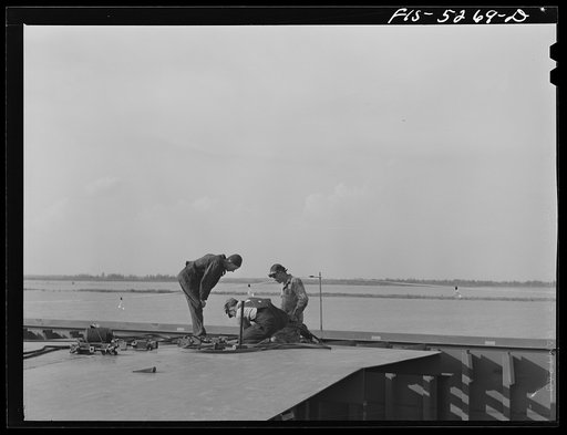 Decatur, Alabama. Ingalls Shipbuilding Company. Welding the deck of a cargo barge