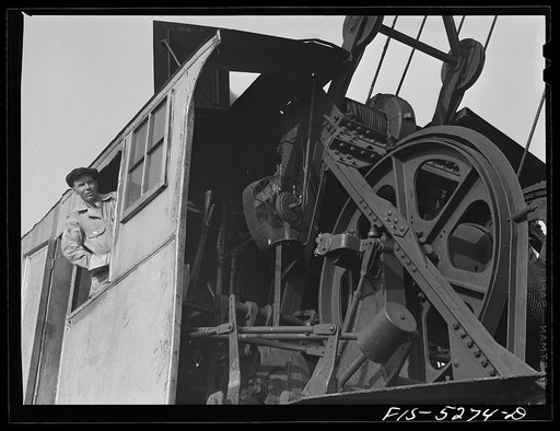 Decatur, Alabama. Ingalls Shipbuilding Company. Crane operator in the yard