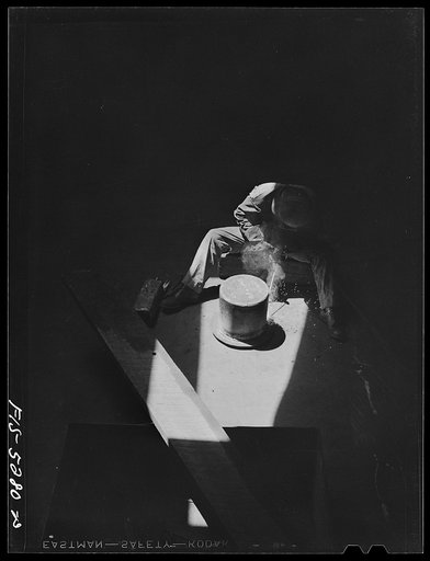 Decatur, Alabama. Ingalls Shipbuilding Company. Welder working on the bottom of one of the holds of a barge