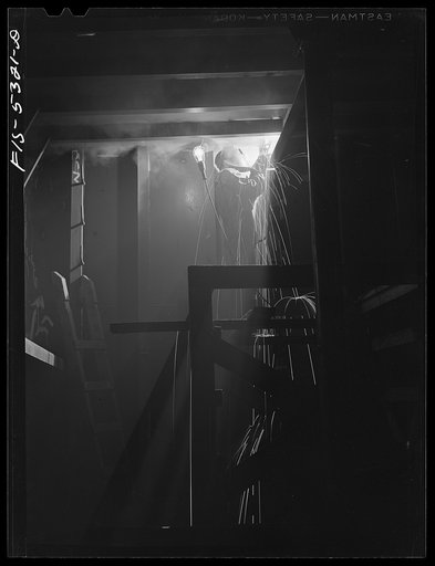 Decatur, Alabama. Ingalls Shipbuilding Company. A welder working on the bulkhead of a barge under construction