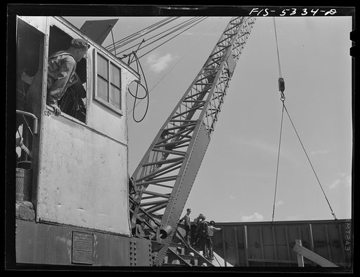 Decatur, Alabama. Ingalls Shipbuilding Company. A section of one of the sides of the stern of a barge being lowered into place