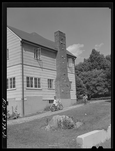 Yonkers, New York. The Garrity children playing in the driveway of their home