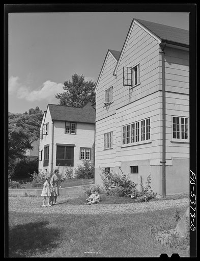 Yonkers, New York. The Garrity children playing in the driveway of their home