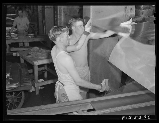 Sheffield, Alabama. Reynolds Alloys Company. Rolling cold aluminum sheets