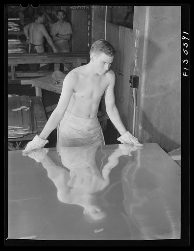 Sheffield, Alabama. Reynolds Alloys Company. Rolling cold aluminum sheets