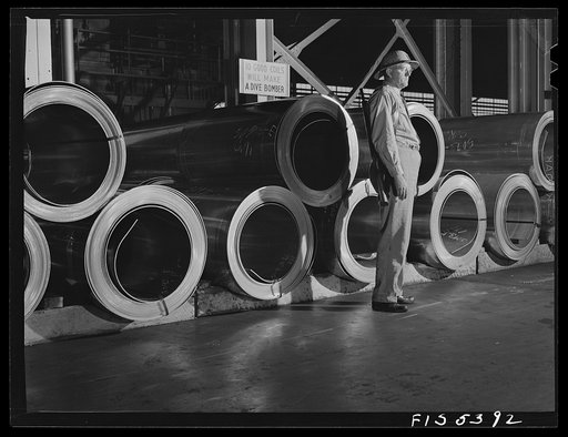 Sheffield, Alabama. Reynolds Alloys Company. Rolls of precious aluminum under guard