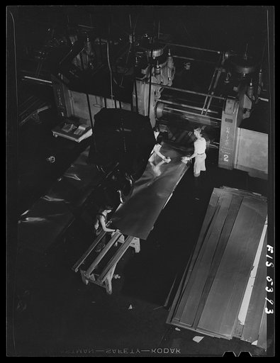 Untitled photo, possibly related to: Sheffield, Alabama. Reynolds Alloys Company. Cold rolling of aluminum sheets