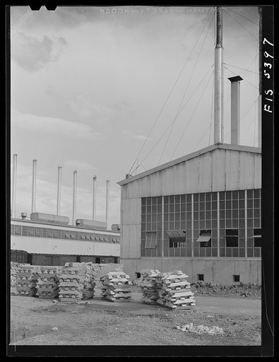 Untitled photo, possibly related to: Sheffield, Alabama. Reynolds Alloys Company. Outside one of the dross-houses where scrap aluminum and shavings are remelted