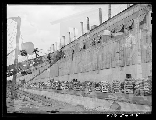 Untitled photo, possibly related to: Sheffield, Alabama. Reynolds Alloys Company. The cast house where the aluminum pigs are melted and cast into slabs for rolling
