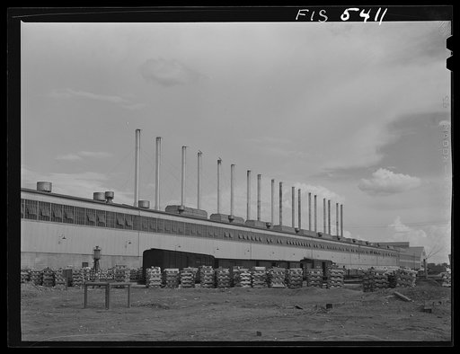 Untitled photo, possibly related to: Sheffield, Alabama. Reynolds Alloys Company. The cast house where the aluminum pigs are melted and cast into slabs for rolling