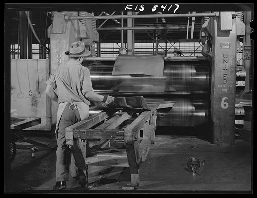 Untitled photo, possibly related to: Sheffield, Alabama. Reynolds Alloys Company. Rolling cold aluminum sheets