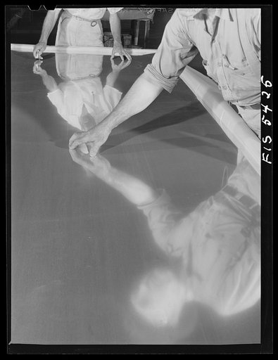 Sheffield, Alabama. Reynolds Alloys Company. Inspecting aluminum sheets before packing and shipping