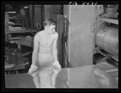Untitled photo, possibly related to: Sheffield, Alabama. Reynolds Alloys Company. Cold rolling of aluminum sheets