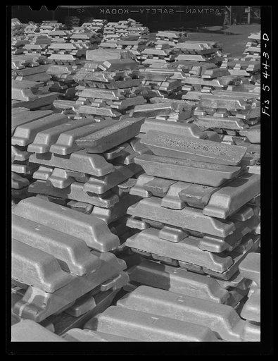Sheffield, Alabama. Reynolds Metal Company. Aluminum pigs in the yard outside the cast house
