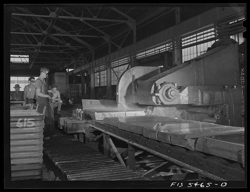 Untitled photo, possibly related to: Sheffield, Alabama. Reynolds Alloys Company. Circular saw for cutting up the aluminum slabs
