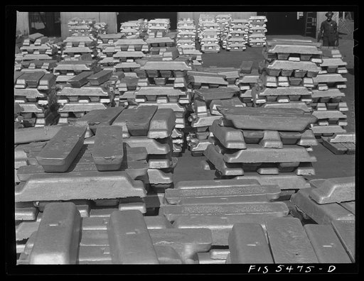Sheffield, Alabama. Reynolds Metal Company. Aluminum pigs in the yard by the cast house