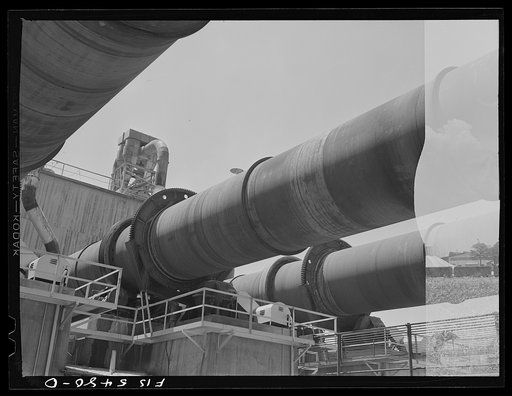 Untitled photo, possibly related to: Sheffield, Alabama. Reynolds Metal Company. Drying kilns used in obtaining alumina from bauxite mixture