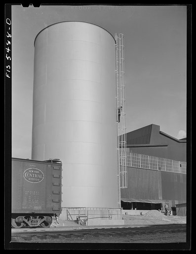Sheffield, Alabama. Reynolds Alloys Company. Storage tank along the side of one of the pot rooms