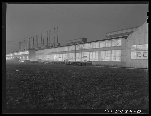 Sheffield, Alabama. Reynolds Alloys Company. Storage tank along the side of one of the pot rooms