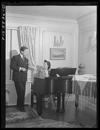 Washington, D.C. The Icelandic legation. Minister Thor Thors and his wife in the living room of their legation on Massachusetts Avenue. The Thors are members of a famous Icelandic fishing family