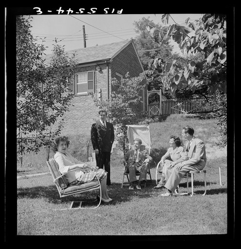 Untitled photo, possibly related to: Washington, D.C. The Icelandic legation. Minister Thors joins his office staff in a brief respite on the lawn outside the chancery. Left to right: Martha Thors, Thor Thors, Asgen Asgenson, Miss Elliot, Bjornsson