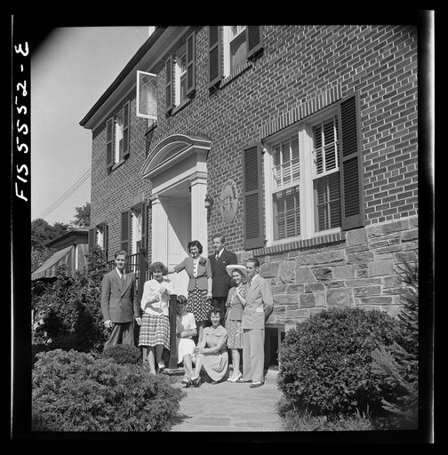 Untitled photos, possibly related to: Washington, D.C. The Icelandic legation. The Thors and their staff on the legation steps