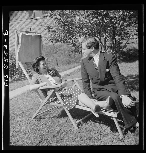 Washington, D.C. Mr. and Mrs. Thor Thors relaxing in their garden behind the legation