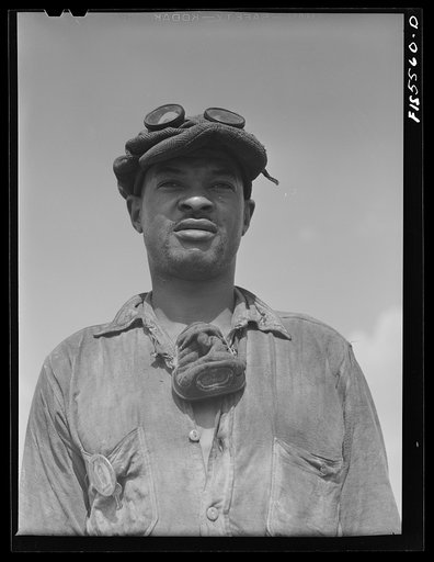 Sheffield, Alabama. Reynolds Alloys Company. Workman in one of the pot rooms