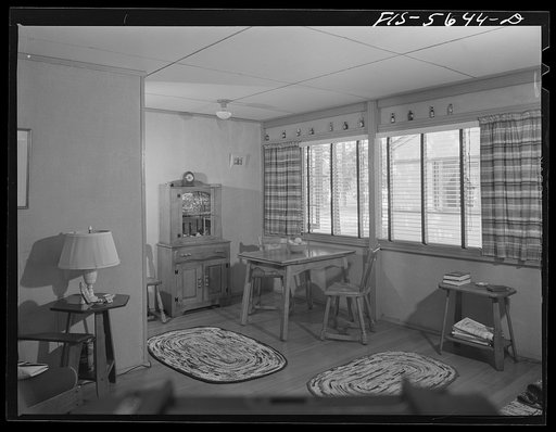 Middle River, Maryland. Housing development for workers at the Glenn L. Martin aircraft plant. Another arrangement of furniture in the living room and dining alcove
